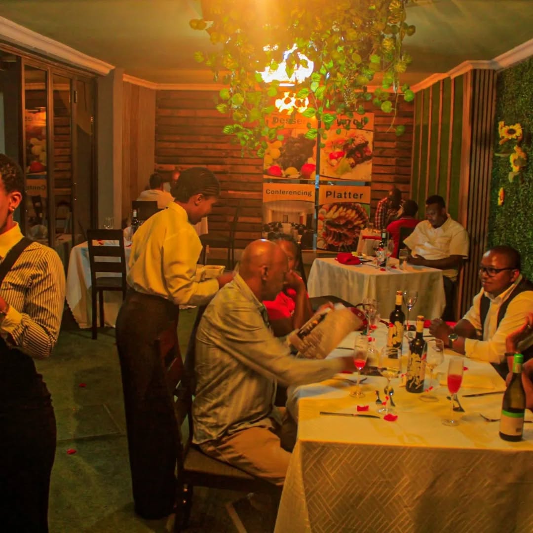 Guests dining by candlelight at Cynthia Guest House